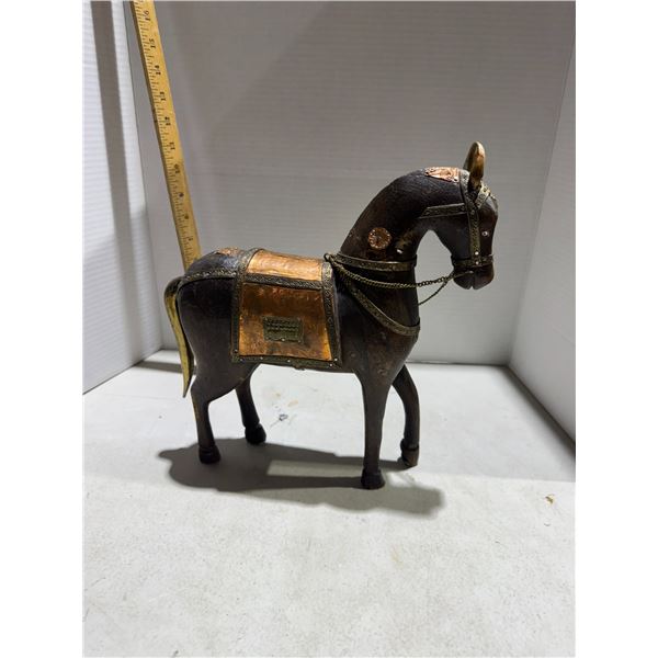 hand-carved wooden horse figurine