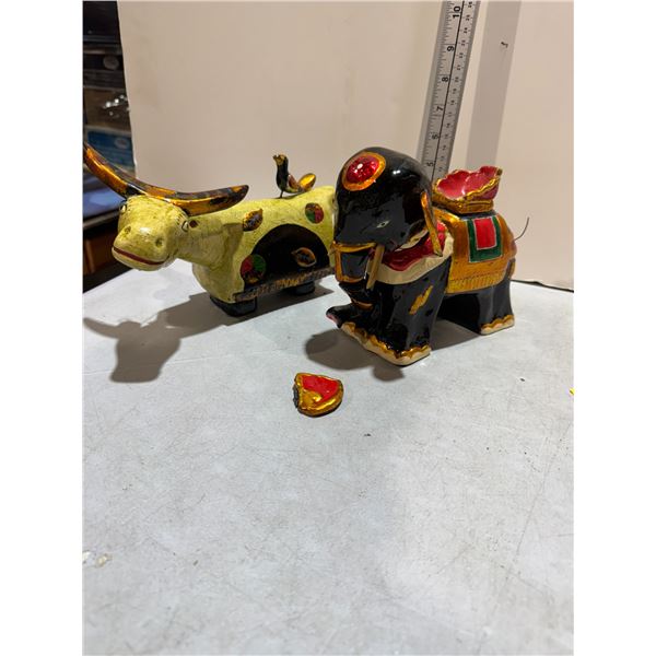 Handcrafted and painted puppets if you pull the tails they move one ear needs repair