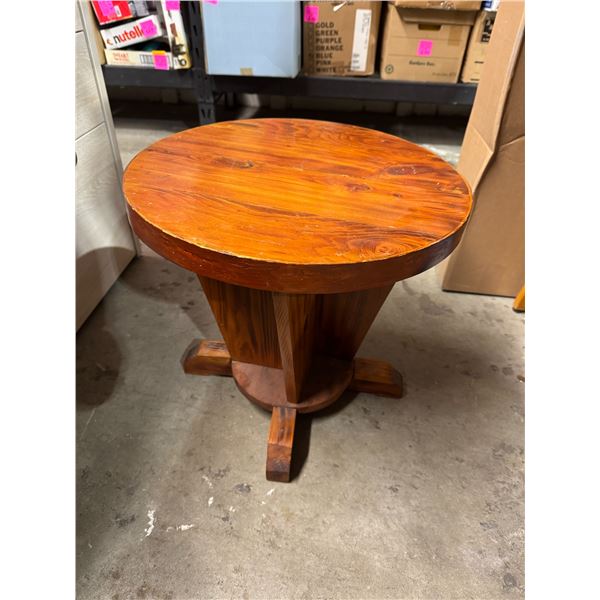 Side table measures 18 inches round by 17 inches tall