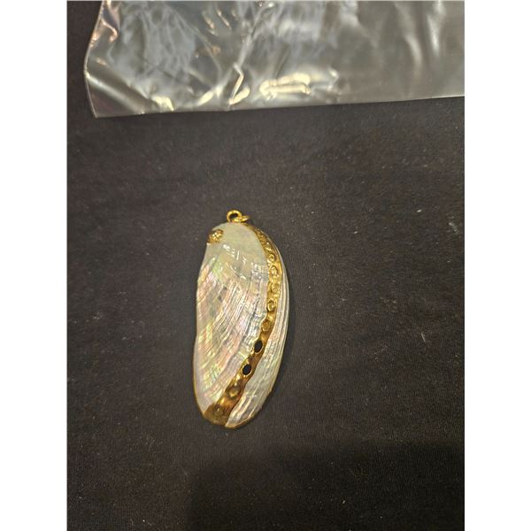 Shell with gold trim pendant