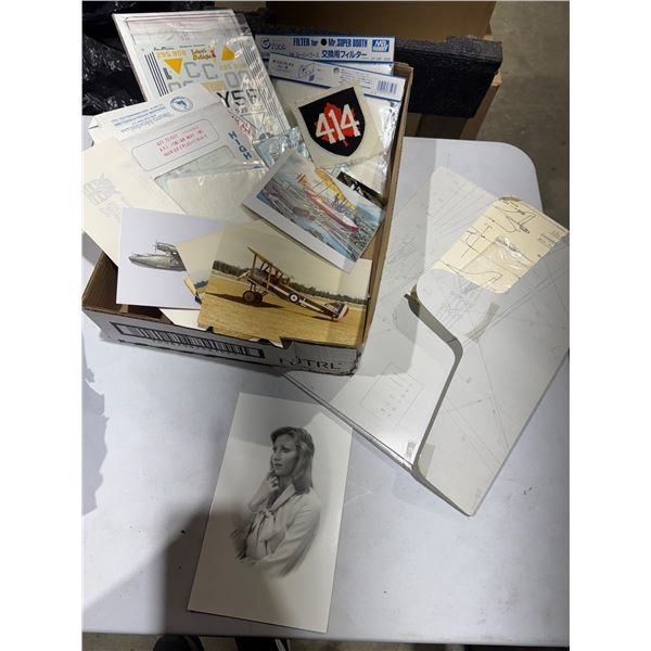 photographs and airplane blue print items