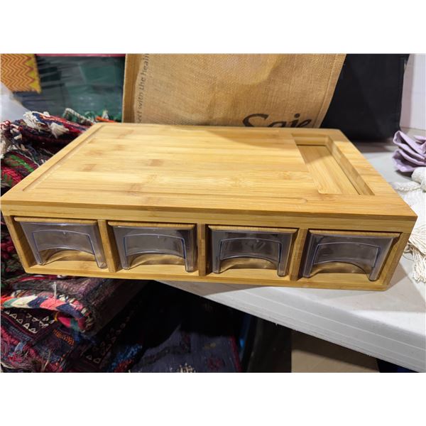 Cutting board with storage containers