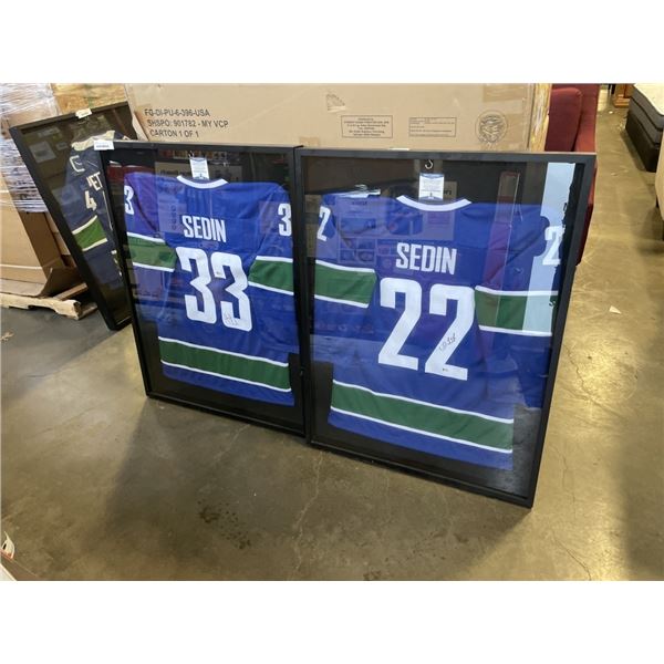 DANIEL AND HENDRICK SEDIN AUTOGRAPHED CANUCKS JERSEYS WITH BECKETT COA IN SHADOW BOX DISPLAY CASES