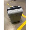 Image 1 : Swiss Gear Silver Hard-Shell Rolling Suitcase With Zipper Closure