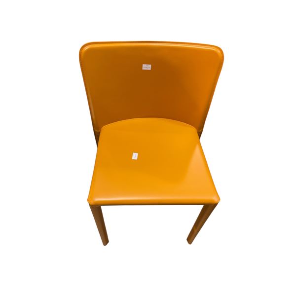 New Kika Orange Chair - RV: $360 CAD (without box)