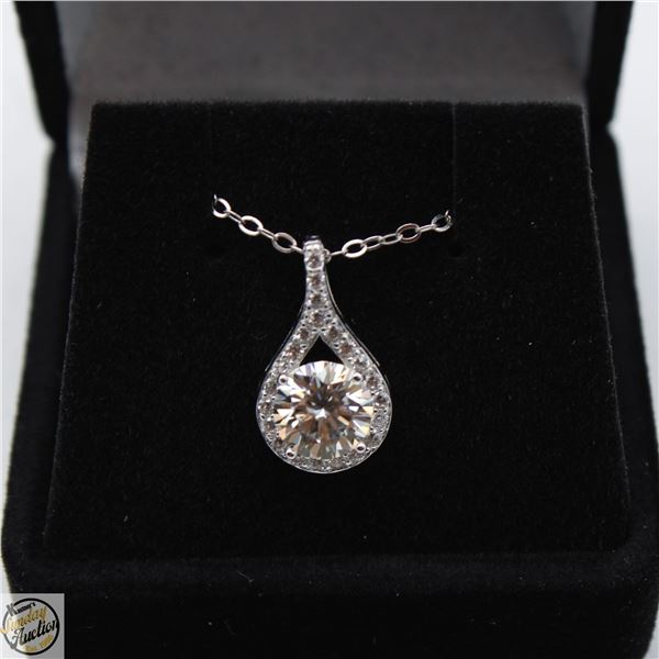 1.00 CARAT GRA CERTIFIED ROUND BRILLIANT CUT MOISSANITE, WITH 22 ROUND CUT CUBIC ZIRCONIA, IN TEAR D