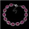 Image 1 : ELEGANT 6X4 OVAL CUT RUBY DIAMOND CUT AND SAPPHIRES BRACELET IN 2-TONE BLACK RHODIUM AND14K WHITE GO