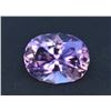 Image 1 : One loose collector's stone with the following: Natural Purple Amethyst, faceting style: Oval Cut Nu