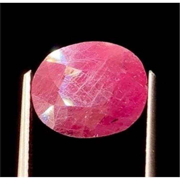 One loose collector's stone with the following: Natural Ruby Shape, faceting style: Oval Cut Number 