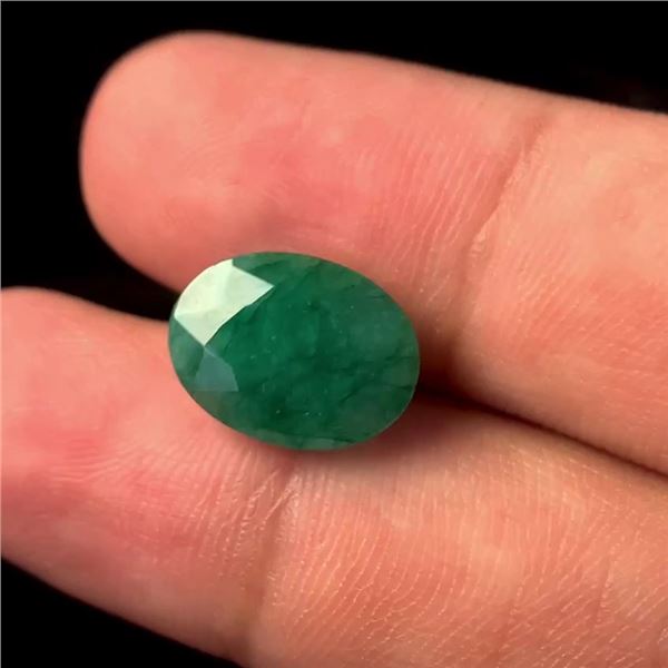 One oval cut natural emerald, measuring 13.90 x 10.33 x 6.30mm, exact weight 6.25ct. Estimated Retai