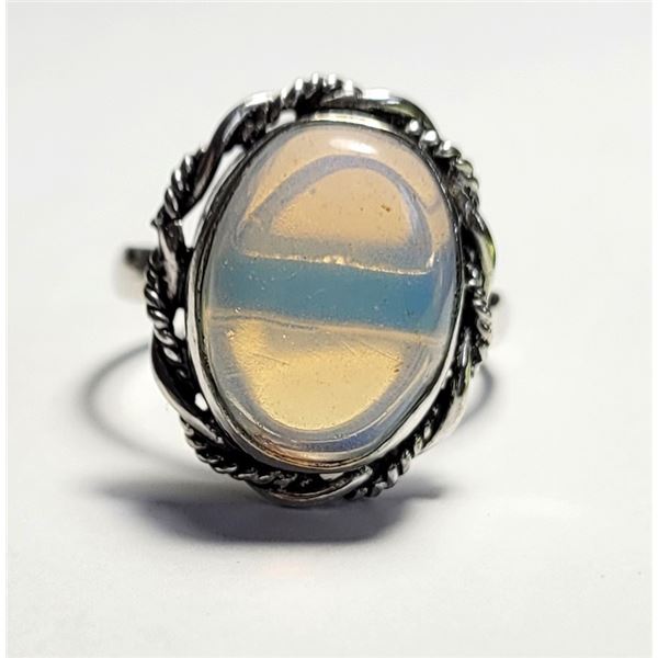 17) NATURAL OVAL OPALINE SIZE 10 RING WITH
