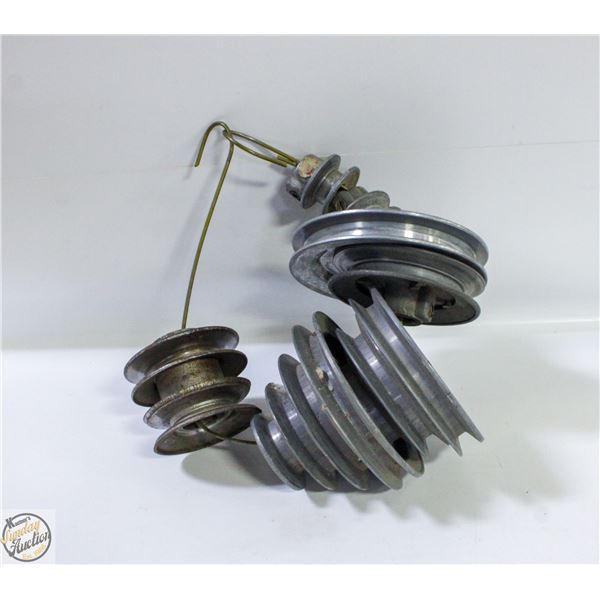 LOT OF STEP PULLEYS AND REGULAR PULLEYS