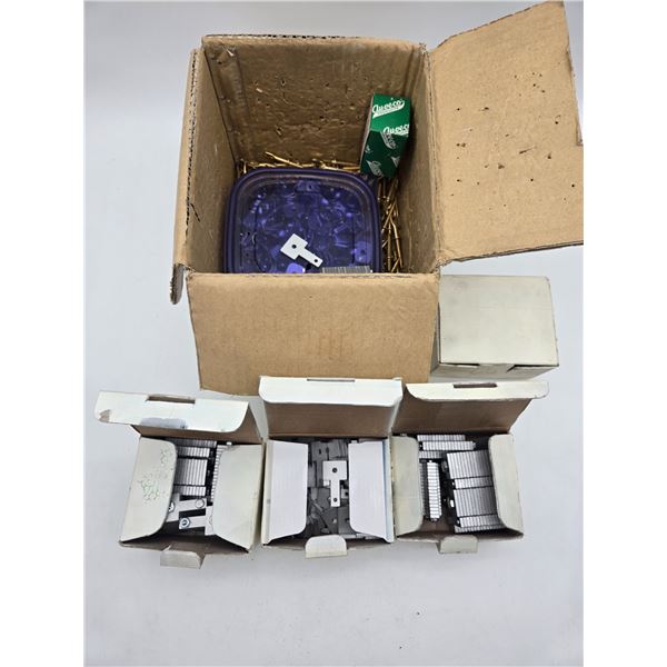 a box of eye lag screws and instillation bits (cl2)