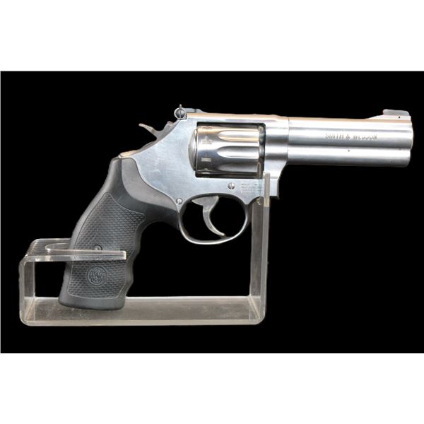 Smith And Wesson Model 617-6  Stainless Revolver- .22 LR- 4" Barrel- Double Action- 10 Shot- Good Co