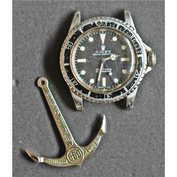 Rolex Oyster Perpetual. No-Date Submariner.  Stainless steel Submariner wristwatch. With black "Mete