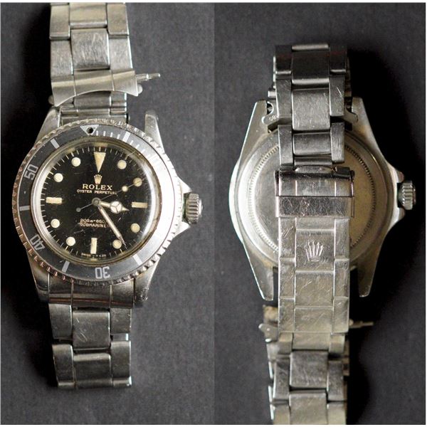 Rolex Oyster Perpetual. No-Date Submariner.  Stainless steel Submariner wristwatch. With black "Mete