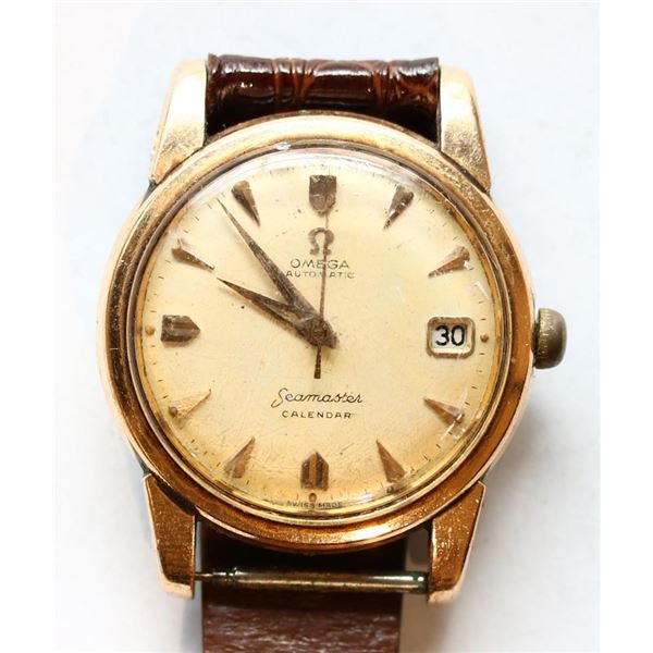 Omega Seamaster - Automatic Omega Seamaster Calendar watch.  Gold plated with partial leather band. 