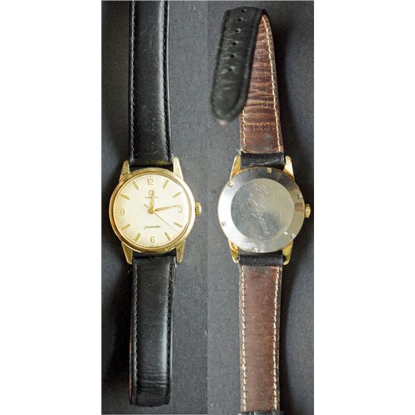 Omega Seamaster Vintage with numerals at the 4 points.   Automatic issue with toned gold case.  Insc