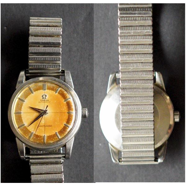 Omega Vintage Men's Seamaster Watch.  Steel Case, no original bracelet and discoloured face.  Comes 