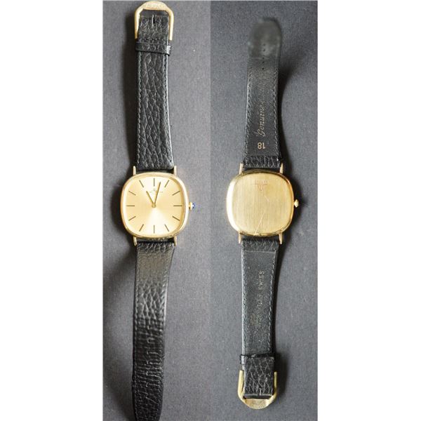 Baume & Mercier - Genève Men's 14kt Gold Automatic watch with leather band.   Blue Sapphire crystal 
