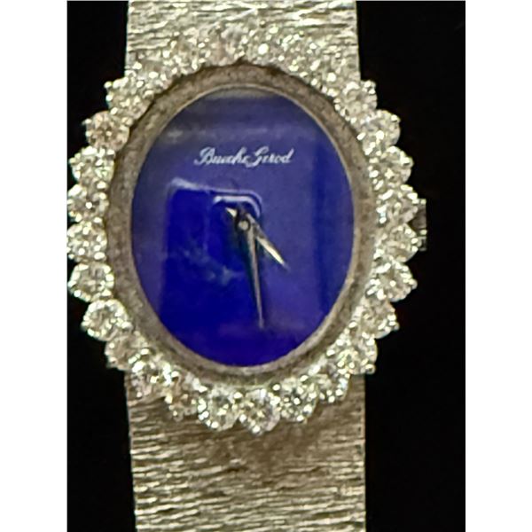 Bueche-Girod WhiteGold Diamond studded Women's watch with Oval Lapis Blue Dial surrounded by 28 roun