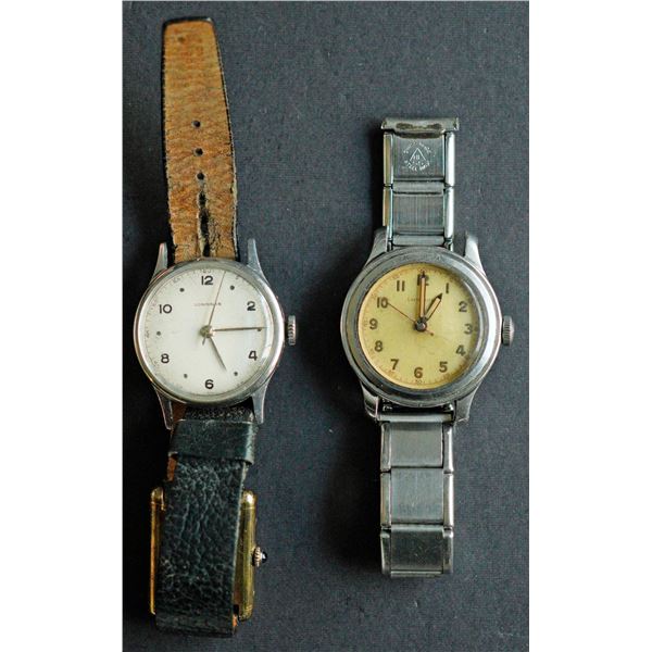 Longine & Cartier Watches.  Lot of 3 vintage issues all with Steel Cases.  The White face example Au