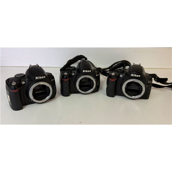 Qty 3 Nikon Camera Bodies: 2 D3000 & 1 D40