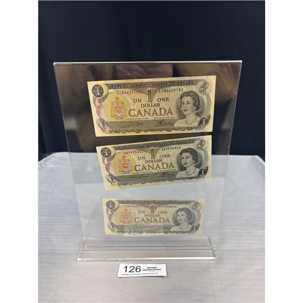 3 Near Mint Condition 1973 $1 Dollar Canadian Bills in Display Stand