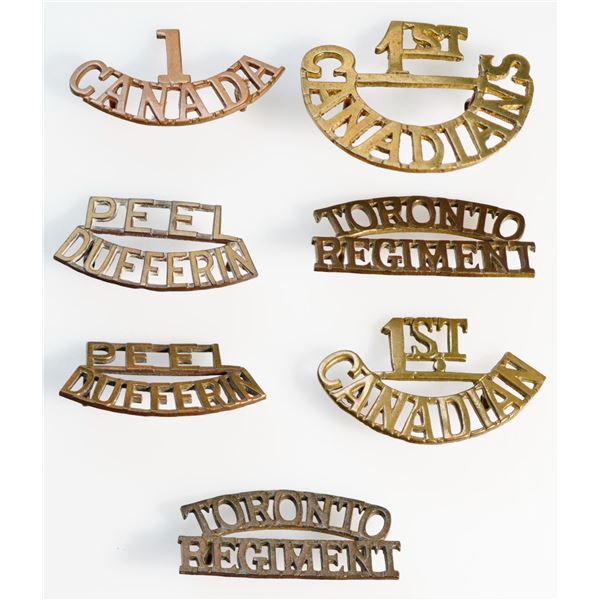 Militaria Insignia C.E.F. WW1;  Shoulder Titles.  Lot of 7 issues.  See Pic.