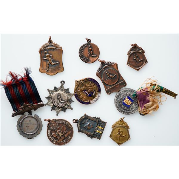 Vintage Sports Medals;  Lot of 13 silver. Silver. Bronze and Brass issues dating early to mid 1900's