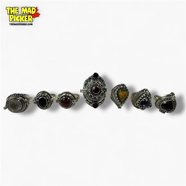7 New Poison Compartment Rings in Silver Settings (all marked .925) Total weight: 68.9 grams
