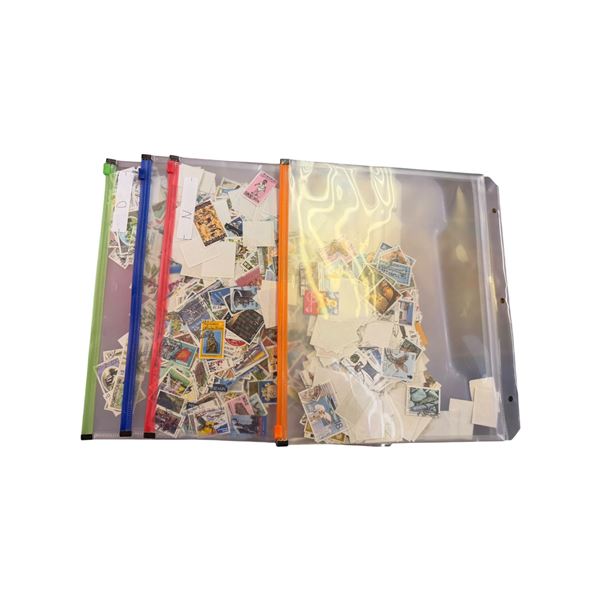 3 folders of Various Stamps From Around the World