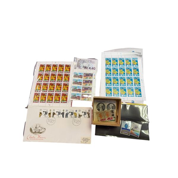 Bag of Unused Stamps, Blocks and Sheets from USA, UK, Australia, and Malaysia