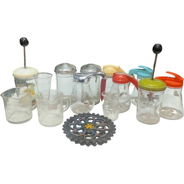 Collection of Vintage Kitchen Collectables: Syrup Dispensers, Measuring Cups, Sugar, Choppers & More
