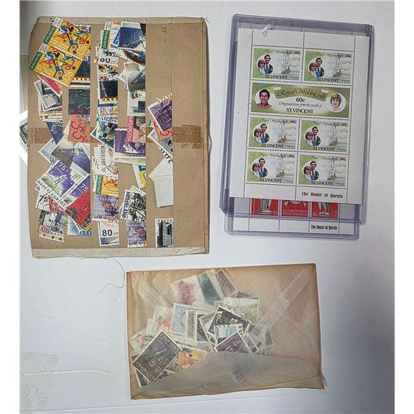 Box of Assorted World Stamps Featuring Mint Sheetlets from St. Vincents and Nevis