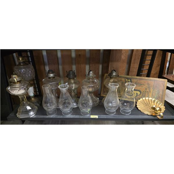 Shelf Lot of Vintage Oil Lamps and Lamp Chimneys