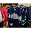 Image 1 : 3 Vancouver Canucks Jerseys (2 with an A) and 1 Calgary Flames Jersey