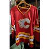 Image 2 : 3 Vancouver Canucks Jerseys (2 with an A) and 1 Calgary Flames Jersey