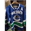 Image 5 : 3 Vancouver Canucks Jerseys (2 with an A) and 1 Calgary Flames Jersey