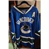 Image 7 : 3 Vancouver Canucks Jerseys (2 with an A) and 1 Calgary Flames Jersey