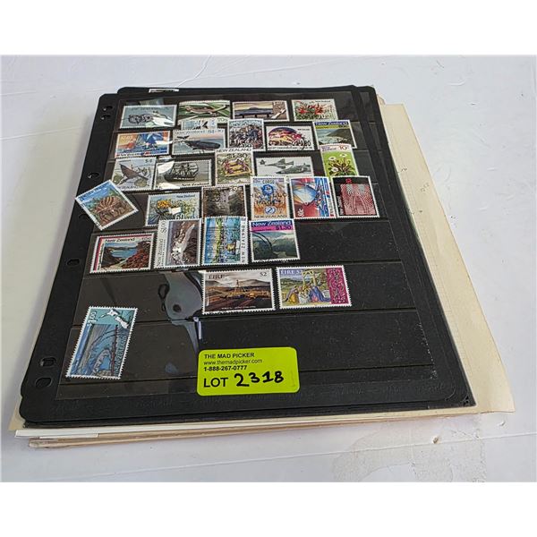 Collection of Canada and World Stamps on Pages * New Zealand, Uganda, Brazil and more