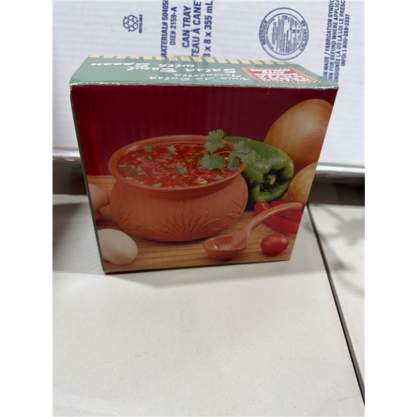 Terra-cotta sell bowl with spoon