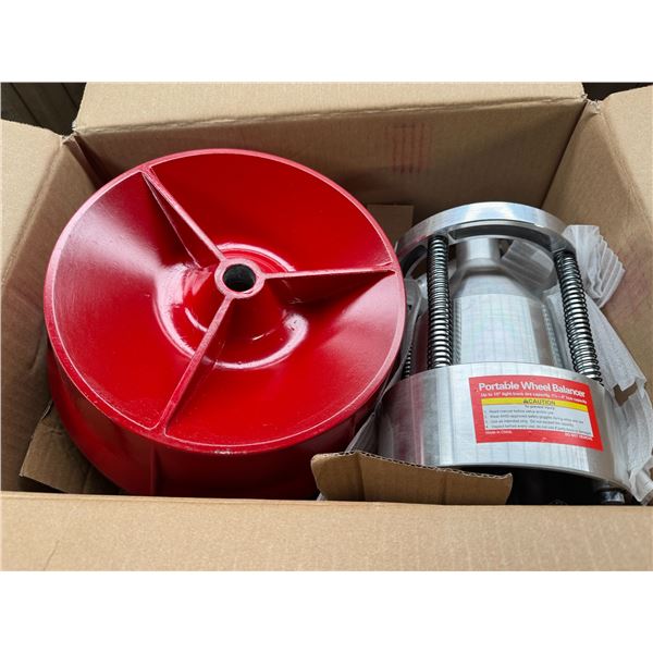 Portable wheel balancer