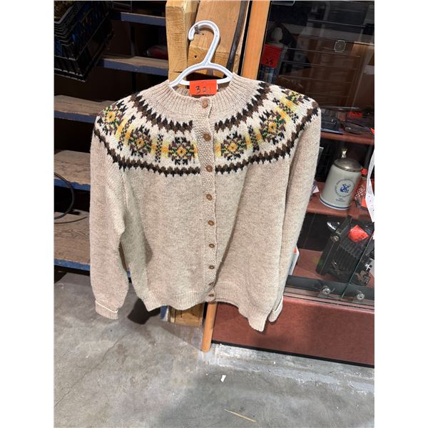 Sweater size not shown