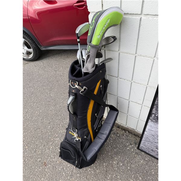 Golf bag with strap and golf clubs