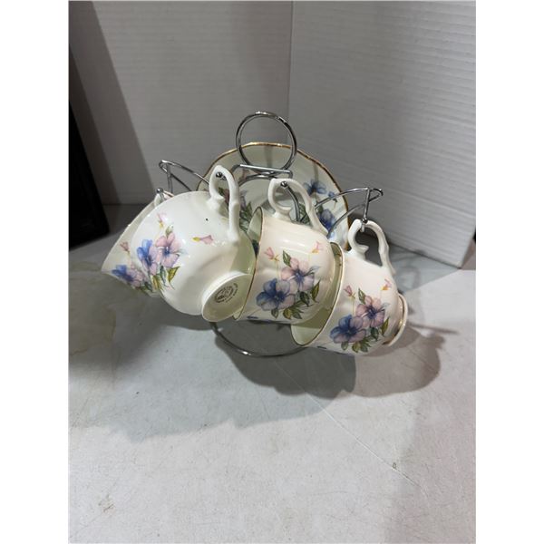 Teacups and saucers with stand