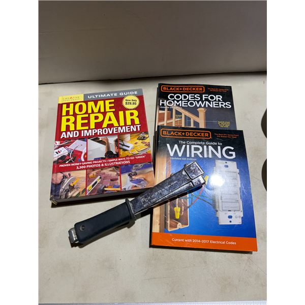 Home repair books and stapler