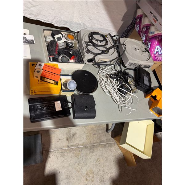 Slide projectors assorted camera related items, film holder, projection land