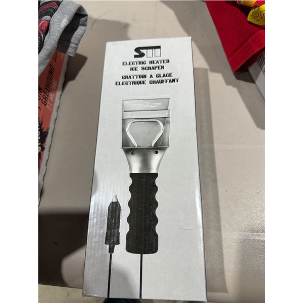 Electronic heated ice scraper