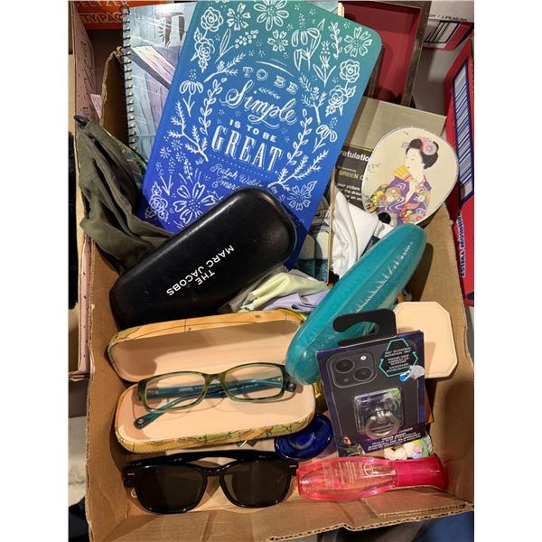 Notebooks glasses, phone, accessory, etc.